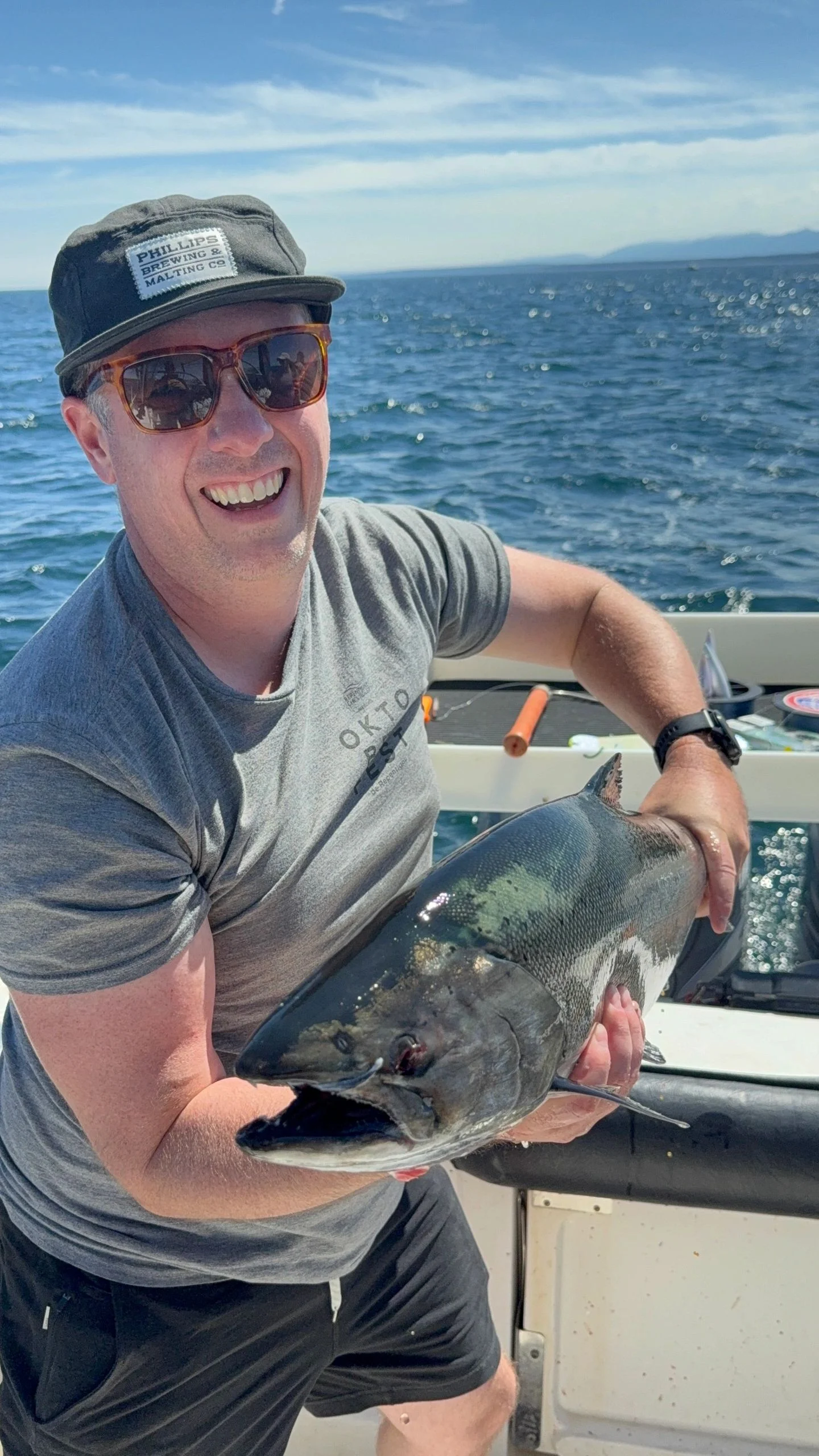 Angler with Coho Salmon Catch