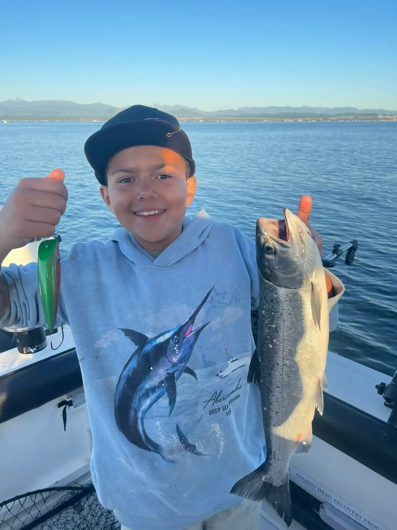 Guide with Junior Angler and Chinook