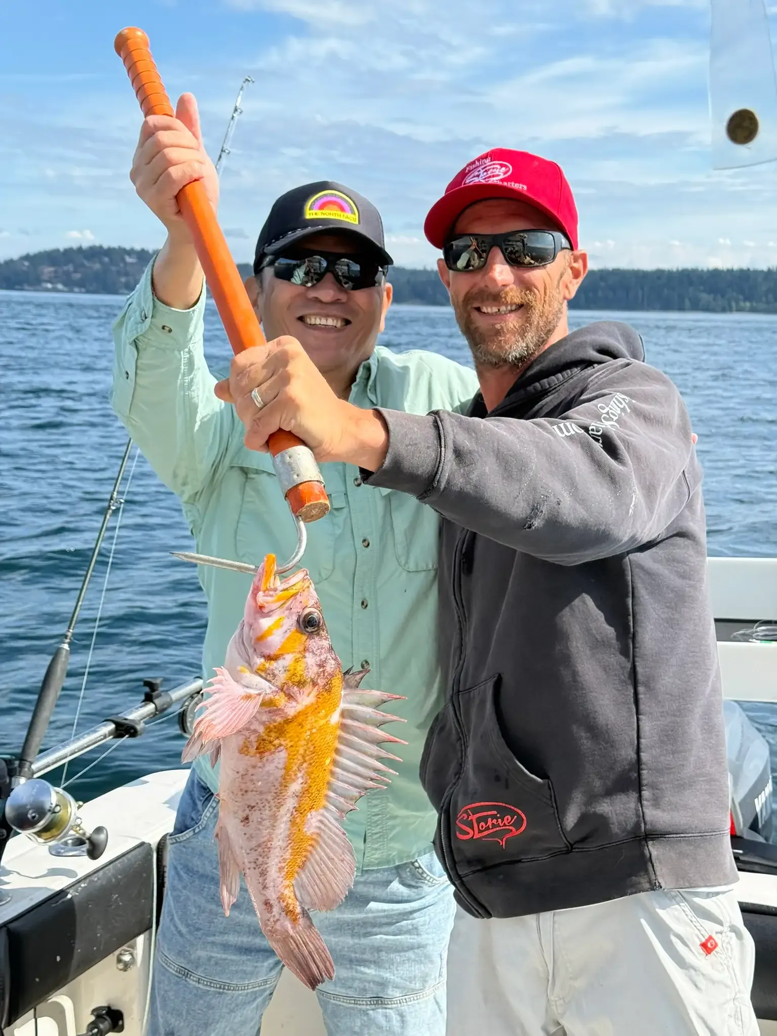 Happy angler with Lingcod