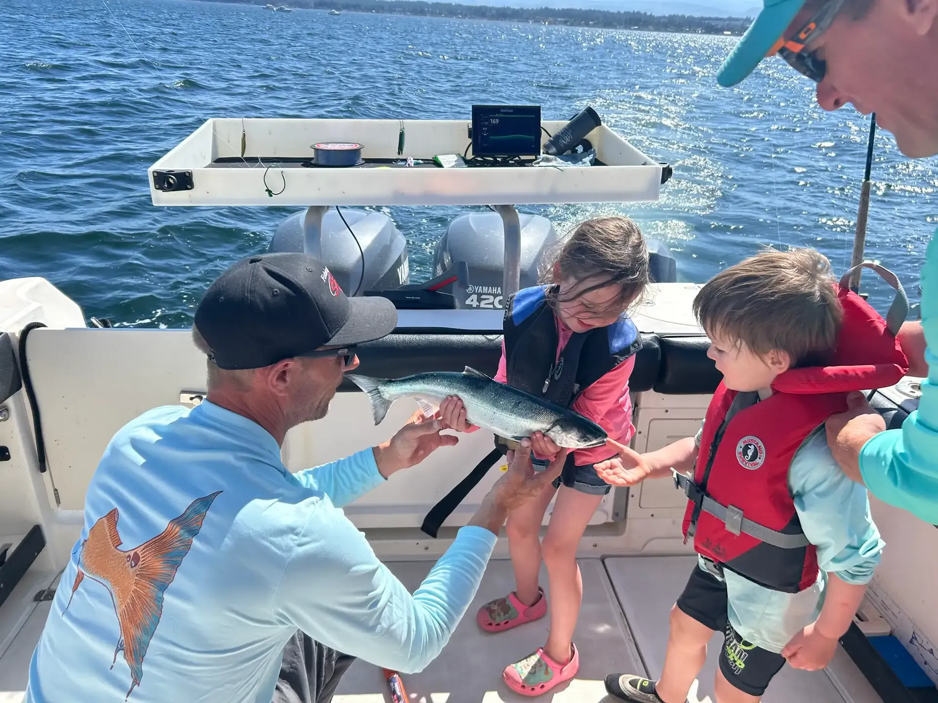 Family Fishing Kids with Coho Salmon
