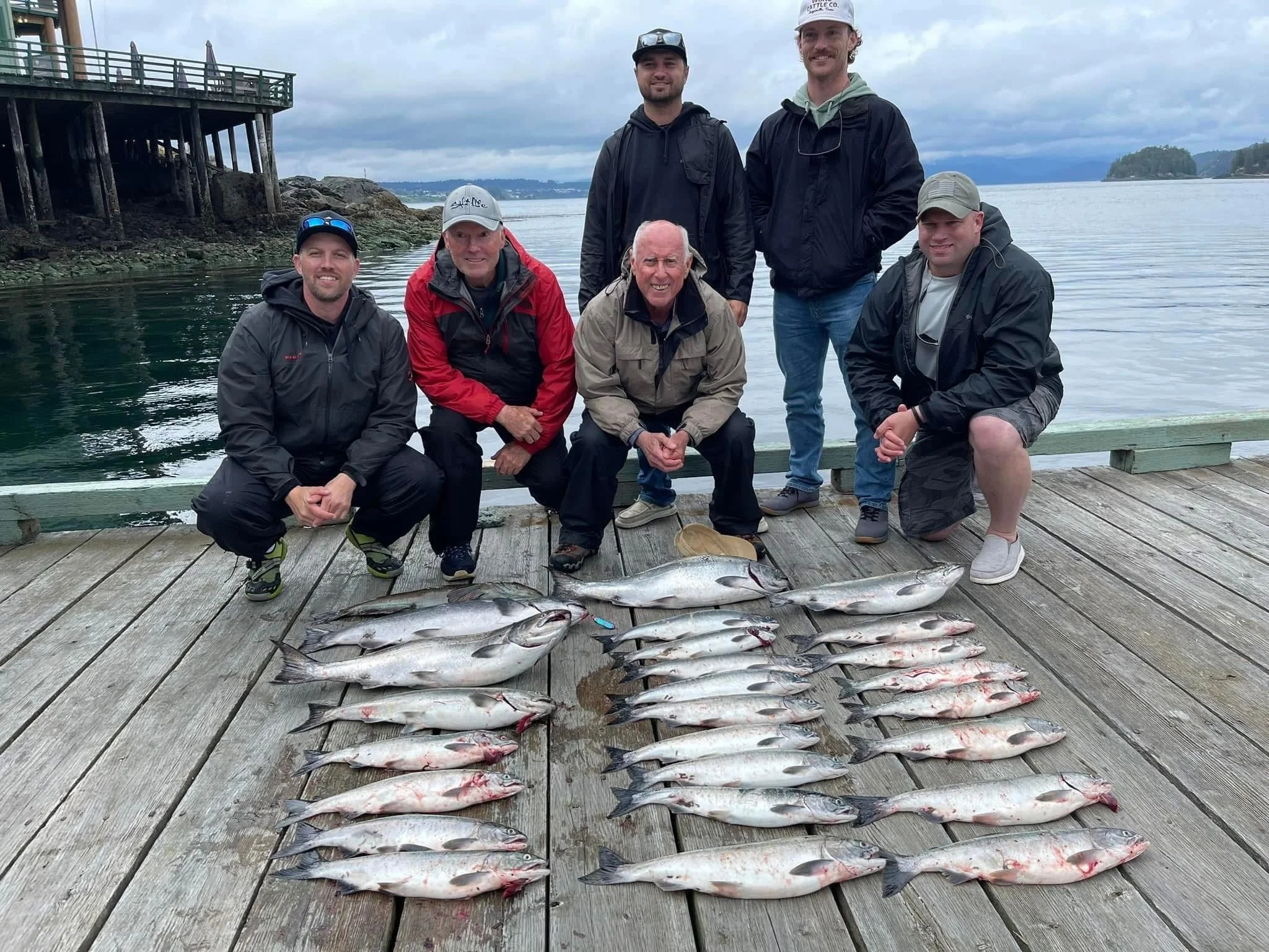 Group on Dock with Salmon Haul