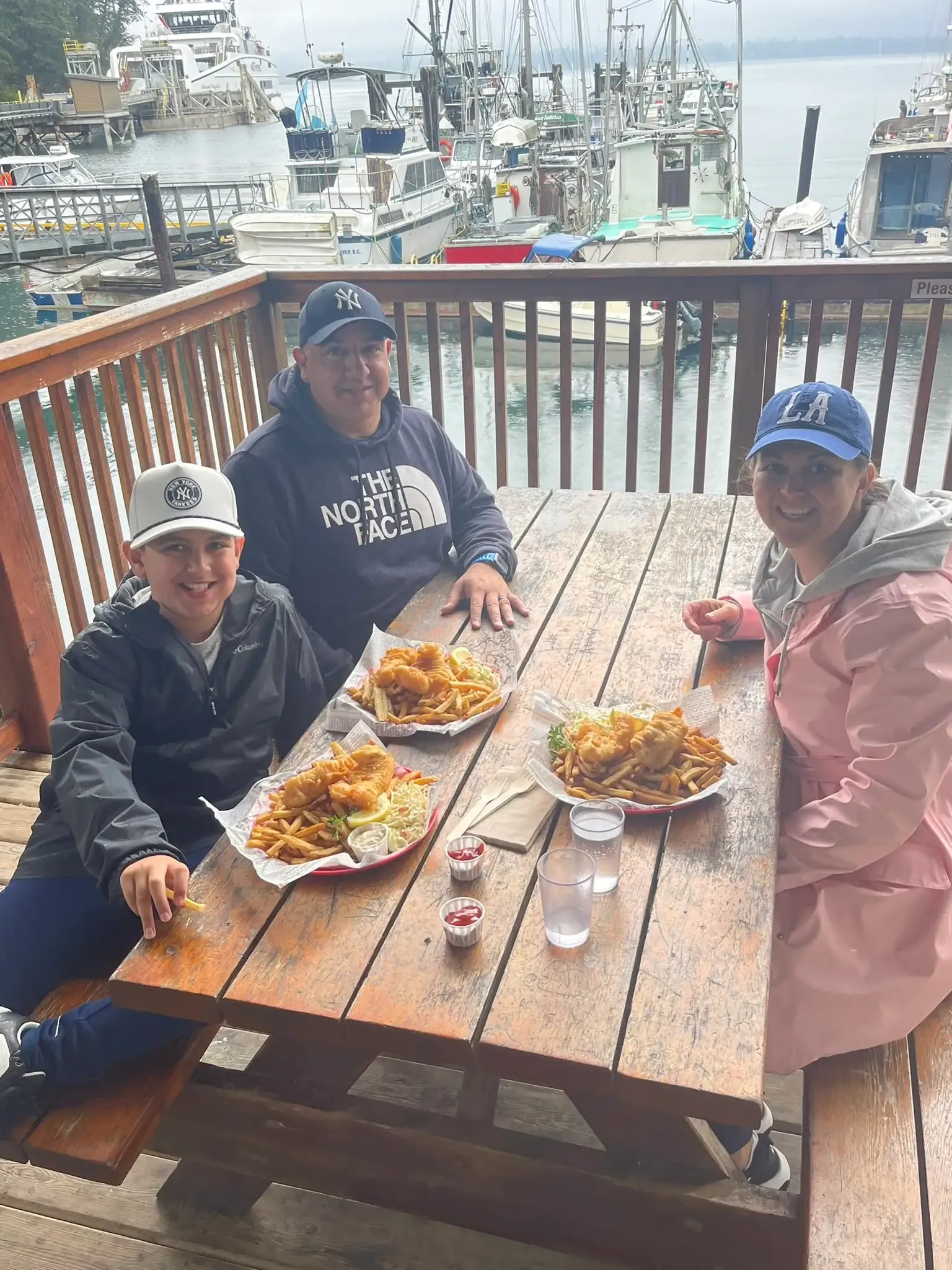 Guests enjoying waterfront dining with fresh catch
