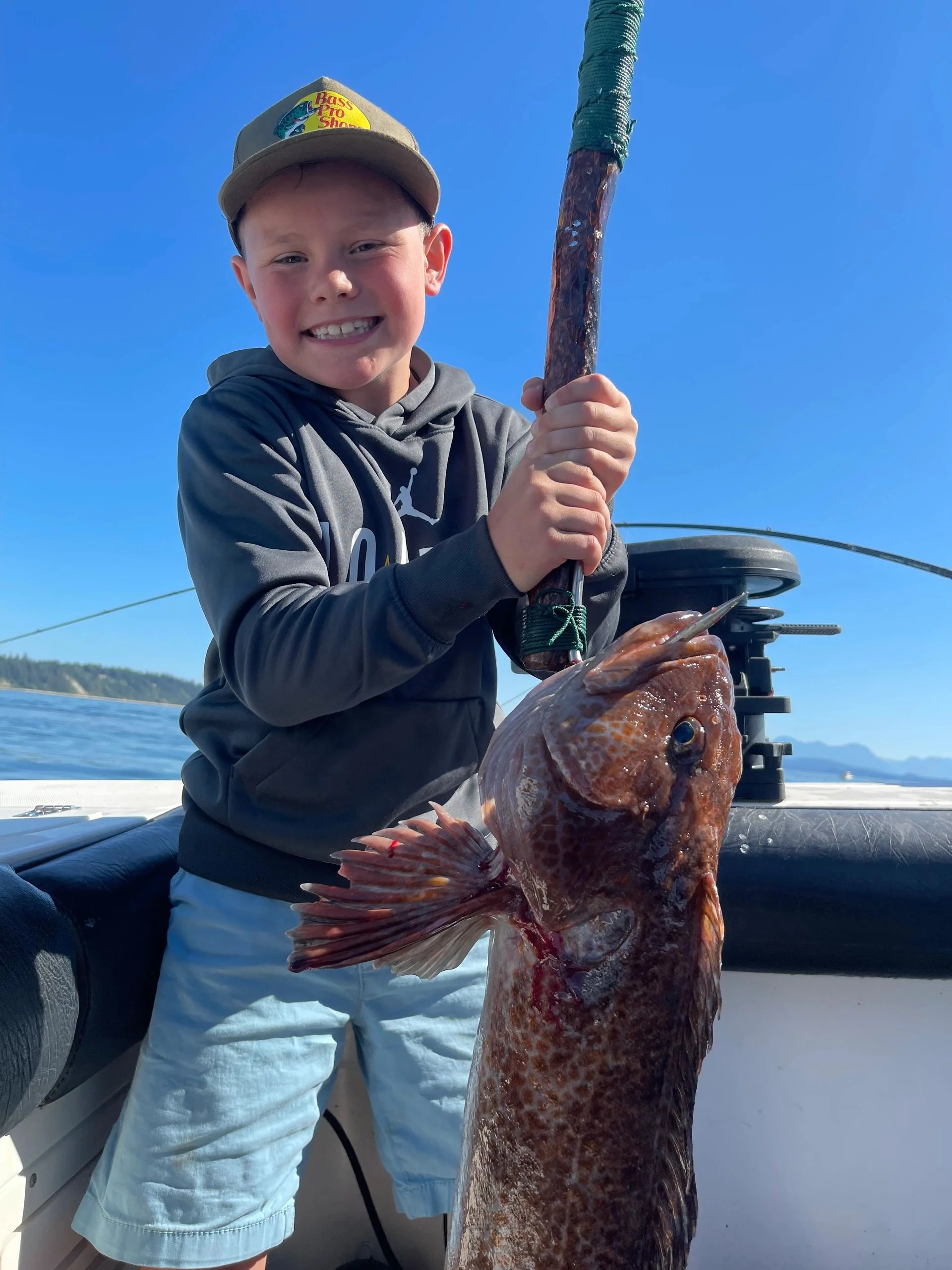 Junior Angler with Rockfish Catch