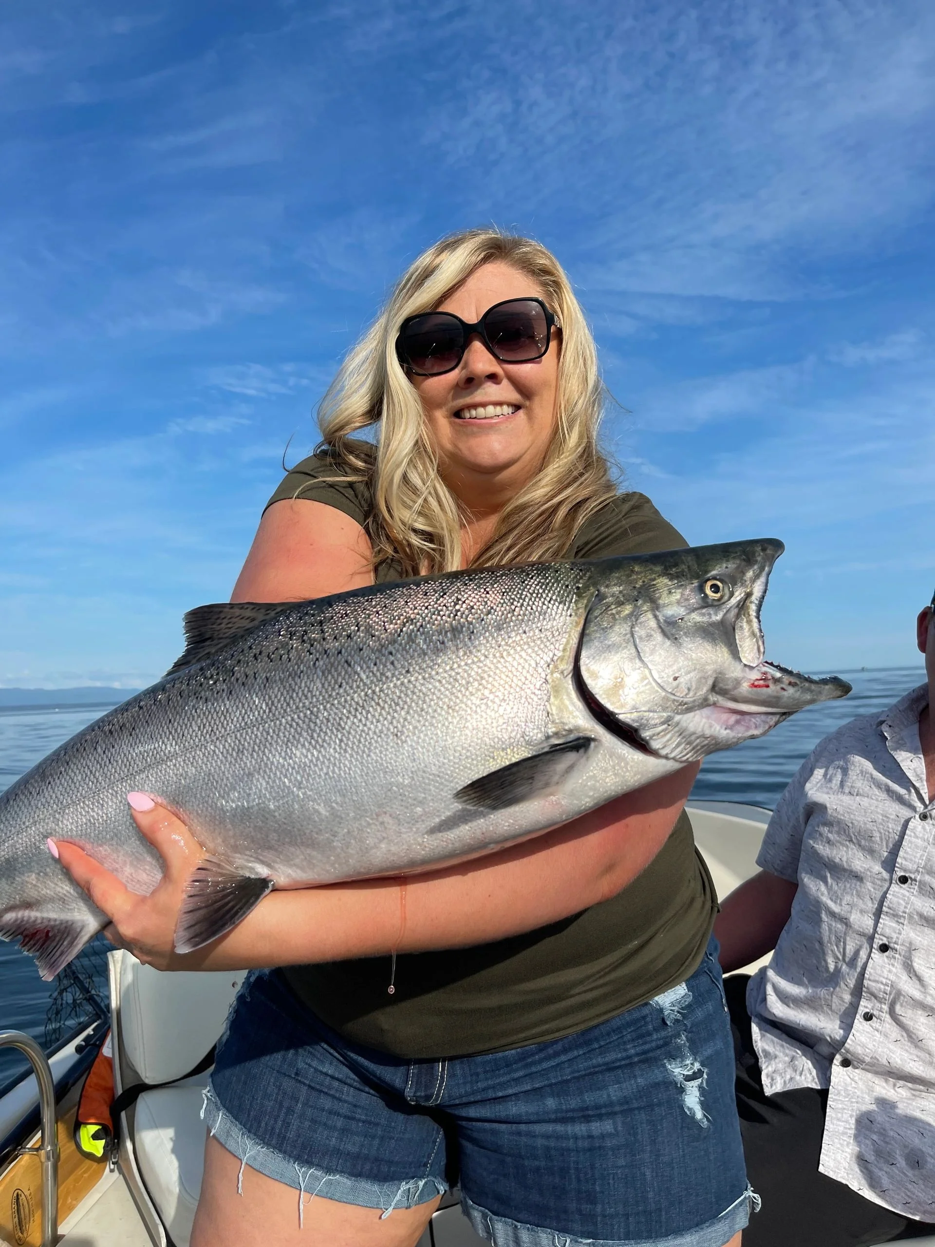 Woman with Large Chinook Salmon